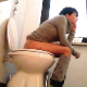 A girl with short brunette hair pisses and takes a shit while sitting on a toilet. Loud, gassy farts are heard with some soft plopping sounds. Her ass must have been a filthy mess because she wipes a lot. About 3.5 minutes.